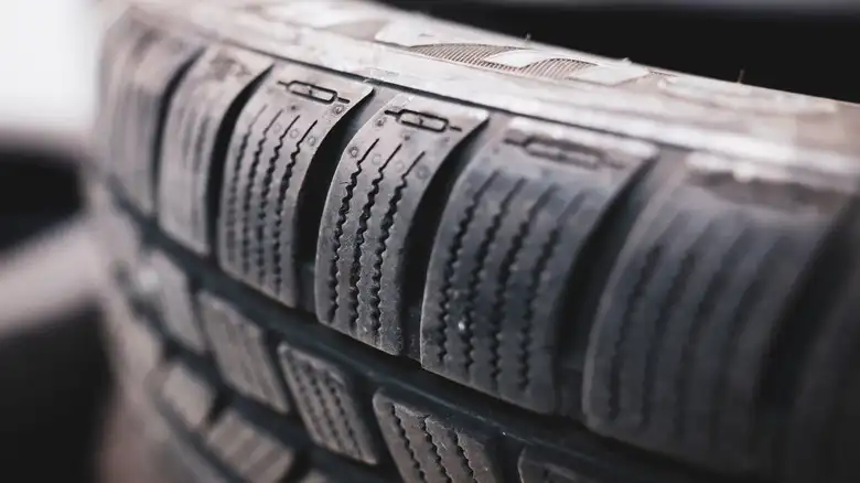 A closer look at the treads of a winter tire with zipper sipes for better grip