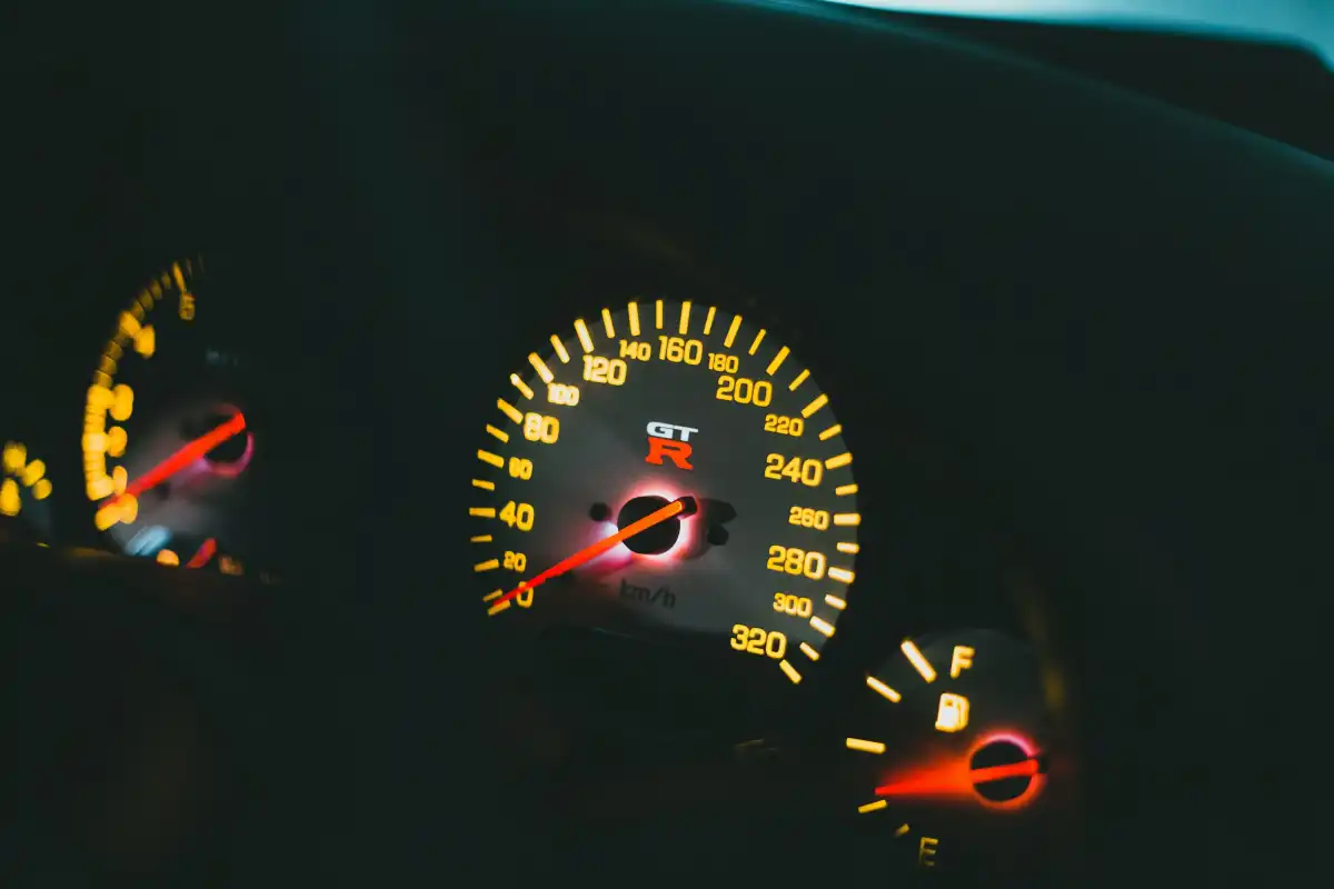 a close up of a speedometer in a car