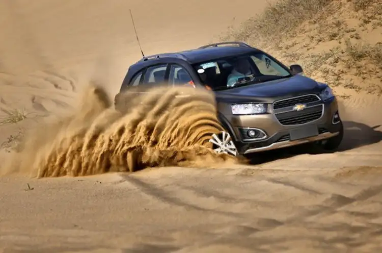 The best way to save yourself from a car stuck in the sand