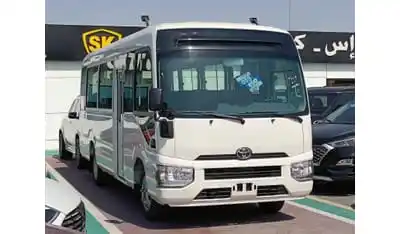 Toyota Coaster 4.2L V6 DIESEL / 23 STR M/T / AUTO DOOR / LUGGAGE RACKS (CODE # CD42B)