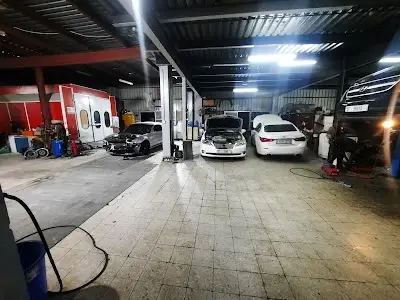 Autoland Car Care Center Garage Workshop